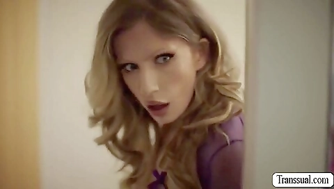 Blonde babe is licking her friend's cock and her mouth