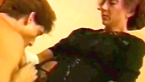 Mature brunette takes off stockings and gets fucked hard