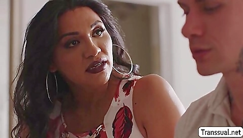 A blonde shemale is getting rimmed in her anal hole